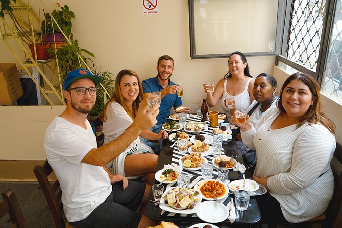 Athens Evening Food Tour - Psirri food stops: puff pastry pie, live-music energy, and local shop talk
