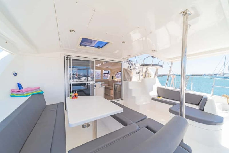 Athens: Half-Day Sunset Catamaran Cruise with Meal & Drinks - Crew Energy: Friendly Hosts, Music, and the Nice Little Extras
