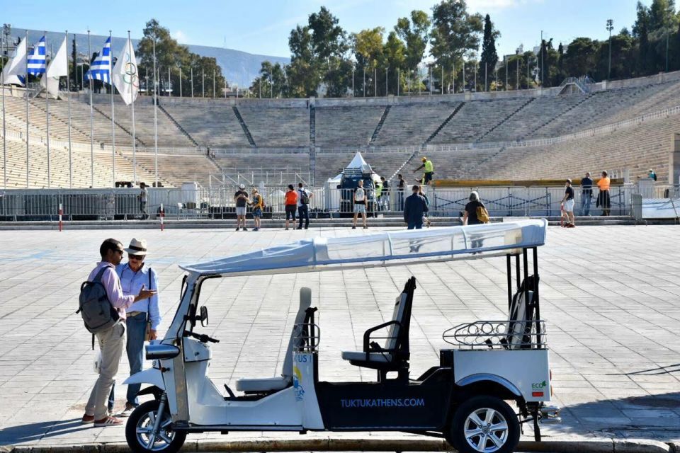 Athens: Private Evening Sightseeing Tour by Electric Tuk-Tuk - Temple of Zeus and Hadrian’s Arch: big stone, quick angles