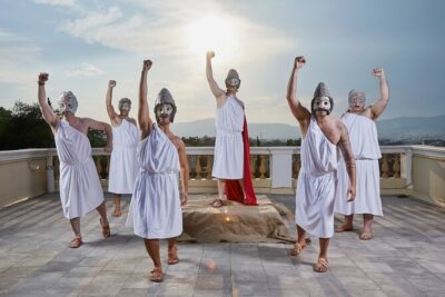 Athens Skip the Line: Open Air Ancient Greek Theatre Performance - The outdoor rooftop vibe and the Acropolis backdrop