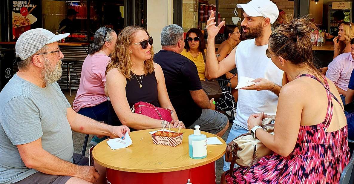 Athens: Street Food Tasting Tour - Souvlaki time: skewers, pita, tomatoes, tzatziki, and your drink