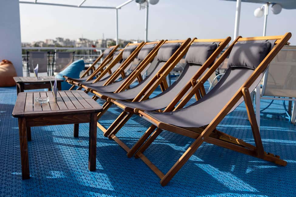 Athens: Swimming Cruise with Lunch, Wine & Live DJ on Board - Greek buffet lunch and drinks: what’s included and what to expect
