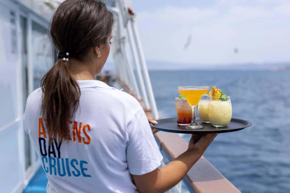 Athens: Swimming Cruise with Lunch, Wine & Live DJ on Board - Stop 1: Agistri island for photos, swimming, and optional bike time