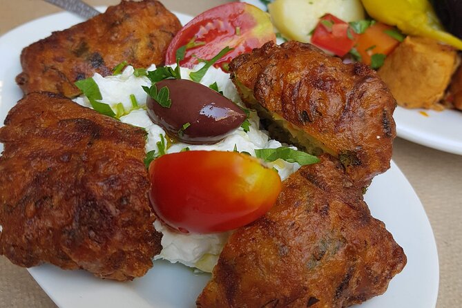 Athens: The Classic Food Tasting Tour - Iconic Greek staples: koulouri, olive oil, olives, rusks, and wine