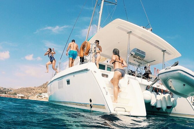 Sail the Athenian Coastline on a Catamaran with Meal & Wine - Sailing back toward Alimos: a relaxed finish with city and gulf views