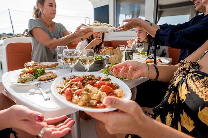 Sail the Athenian Coastline on a Catamaran with Meal & Wine - Meal and wine experience: sips throughout, not just at lunch